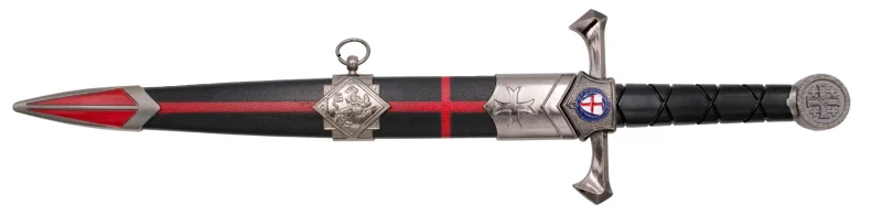 Daga Templaria S0300, el pomo está acabado en níquel y el mango en plástico negro, la guarda acabada en níquel con un escudo templario. El tamaño total es de 40 cm con hoja de acero. La vaina está acabada en plástico negro con una cruz en rojo con los detalles metálicos en níquel. Ref. S0300 - Imagen 2